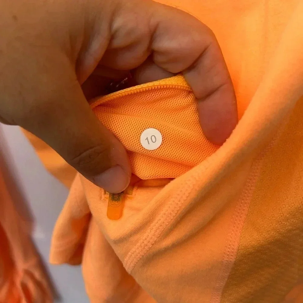 ! Lululemon orange long sleeve shirt sz 10